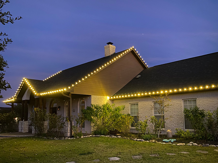 Christmas light installation on a ranch style home in Waco TX